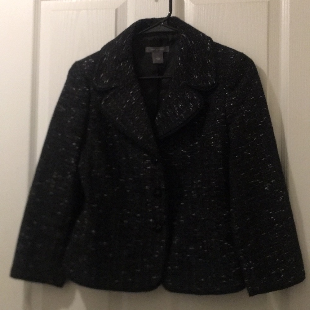 Matching blazer and skirt set.